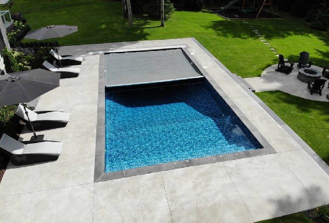 A pool with an awning over it's top.