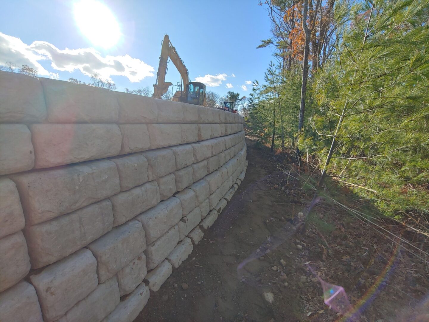 A view of the side of a wall from behind.